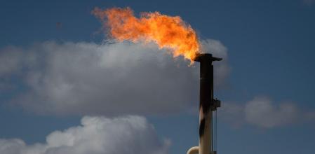 Flares burn off excess natural gas at the Endeavor Energy Resources LP oil and gas wells near Tarzan, Texas, US, on Saturday, March 15, 2025. The Permian Basin, a sprawling shale patch that lies beneath Texas and New Mexico, is North America's most prolific shale patch. Photographer: Justin Hamel/Bloomberg